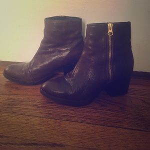 Brown leather booties with gold side zipper